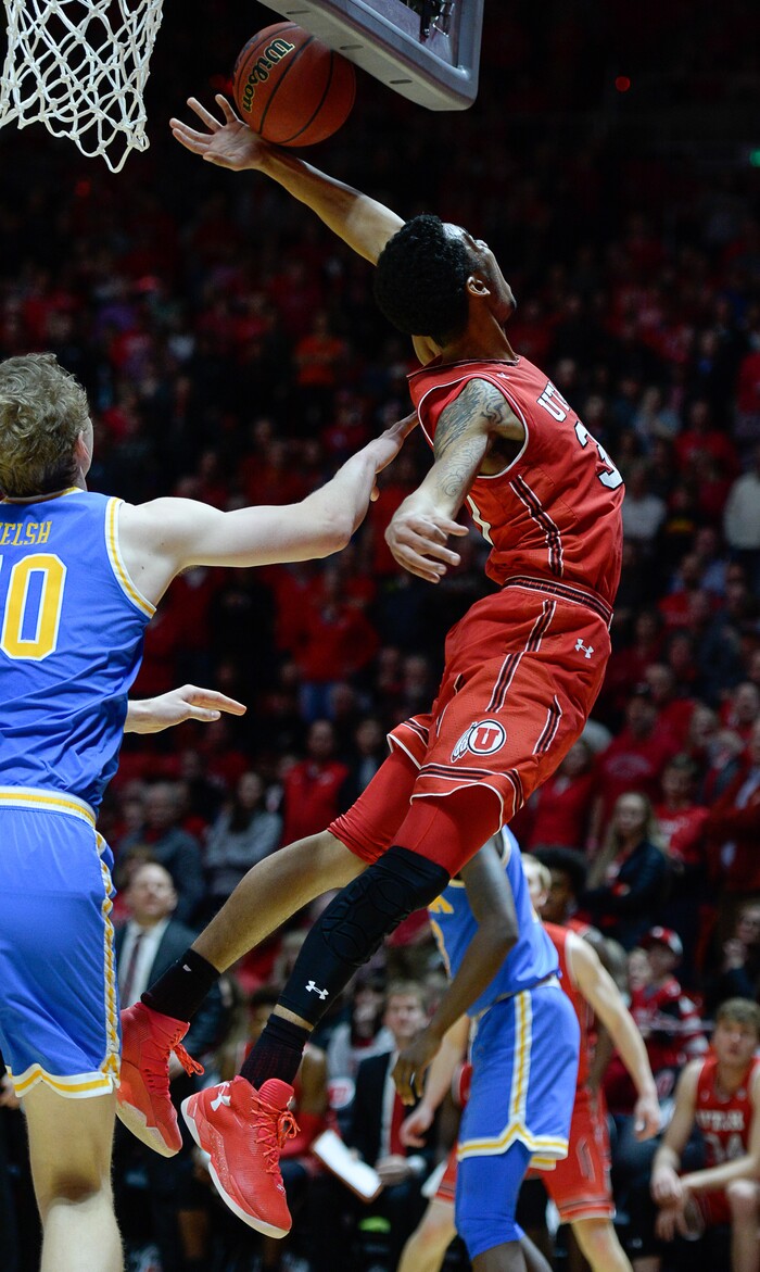 (Francisco Kjolseth  |  The Salt Lake Tribune)  Utah Utes guard Gabe Bealer (30) arches back in a missed attempt as the University of Utah hosts UCLA in NCAA basketball at the Huntsman Center in Salt Lake City, Thursday, Feb. 22, 2018.