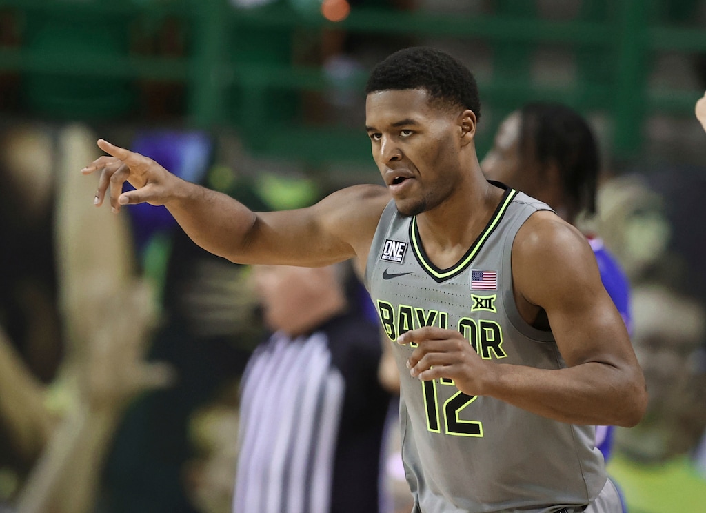 Baylor guard Jared Butler reacts to this three-point play against Kansas in the first half of an NCAA college basketball game, Monday, Jan. 18, 2021, in Waco, Texas. (Rod Aydelotte/Waco Tribune Herald via AP)