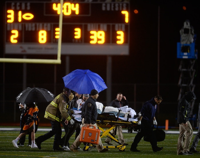 (Francisco Kjolseth  |  The Salt Lake Tribune)  Timpview's  Chandler Sorenson is taken off the field after being injured in the third quarter against Corner Canyon in game action on Thursday, Sept. 21, 2017.