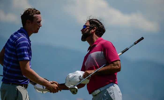 (Francisco Kjolseth  |  The Salt Lake Tribune)  Spencer Fletcher, left, of Los Altos, CA, shakes hands with Joe Summerhays of Syracuse after a round of golf in Saratoga Springs. A mixture of local pros and nationwide travelers make their annual attempt to qualifying for the Utah Championship on the Web.com Tour and a shot to play in a PGA Tour-brand event at Talons Cove Golf Course on Monday, July 7, 2018. Only 12 players advance from a field of roughly 140.