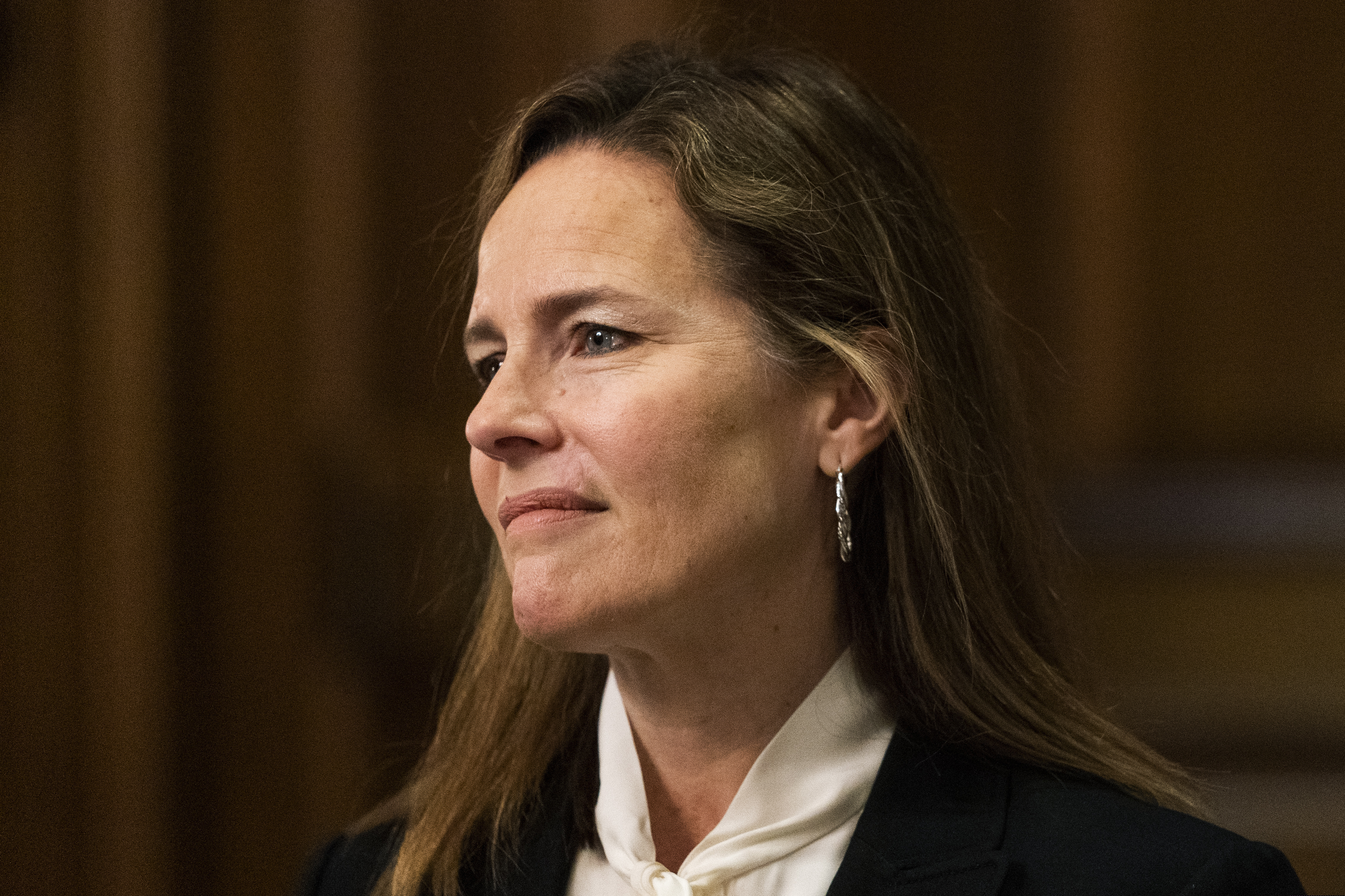 (Manuel Balce Ceneta | AP file photo)  Supreme Court nominee Judge Amy Coney Barrett, listens as Sen. Steve Daines, R-Mont., speaks during their meeting on Capitol Hill in Washington on Oct. 1, 2020.