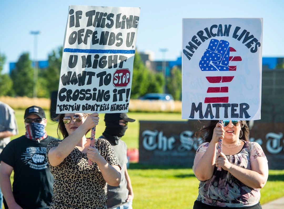 (Rick Egan  |  The Salt Lake Tribune)     Police supporters upset by a Pat Bagley cartoon, protest The Salt Lake Tribune in West Valley City, on Thursday, Sept. 3, 2020.