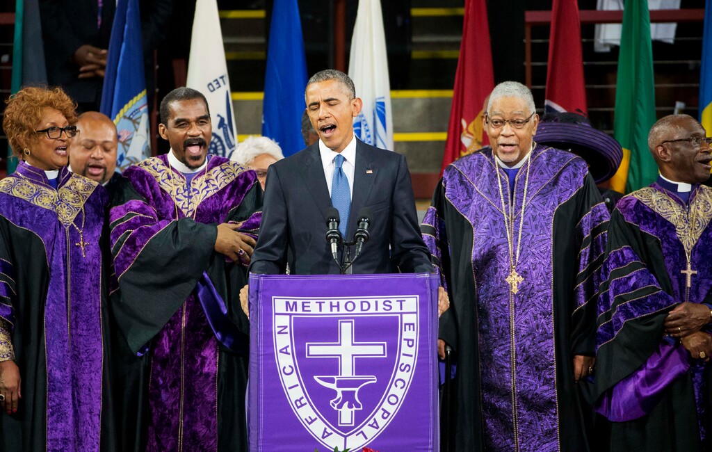 (David Goldman | AP file photo) In this June 26, 2015 photo, President Barack Obama sings "Amazing Grace" during services honoring the life of Rev. Clementa Pinckney, at the College of Charleston TD Arena in Charleston, S.C.. Pinckney was one of the nine people killed in the shooting at Emanuel AME Church in Charleston.