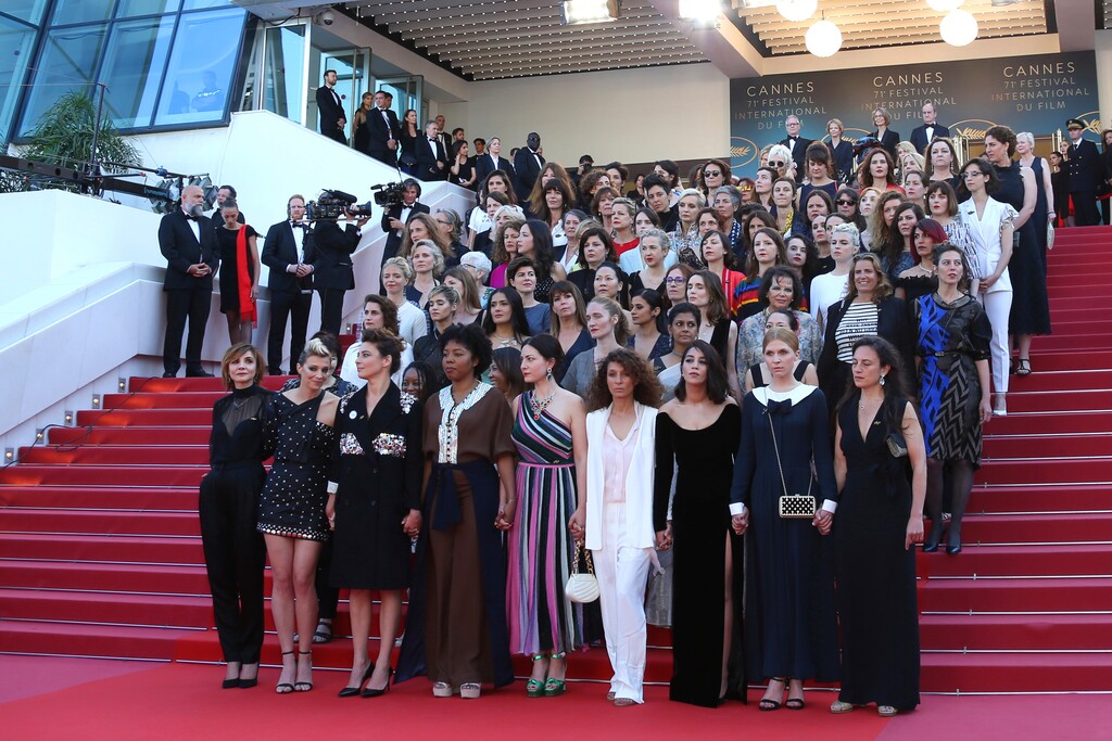 (Joel C Ryan | Invision | The Associated Press) Eighty two film industry professionals stand on the steps of the Palais des Festivals to represent, what they describe as pervasive gender inequality in the film industry, at the 71st international film festival, Cannes, southern France, Saturday, May 12, 2018. Since the Cannes Festival was created, 82 films directed by women have been included in official competition, whilst 1,645 films directed by men were selected.