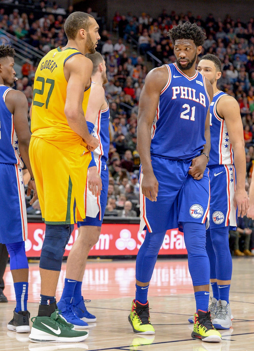 Leah Hogsten  |  The Salt Lake Tribune  Utah Jazz center Rudy Gobert (27) gets a look from Philadelphia 76ers center Joel Embiid (21). The Philadelphia 76ers defeated the Utah Jazz 114- 97 at Vivint Smart Home Arena, Thursday, December 27, 2018. 