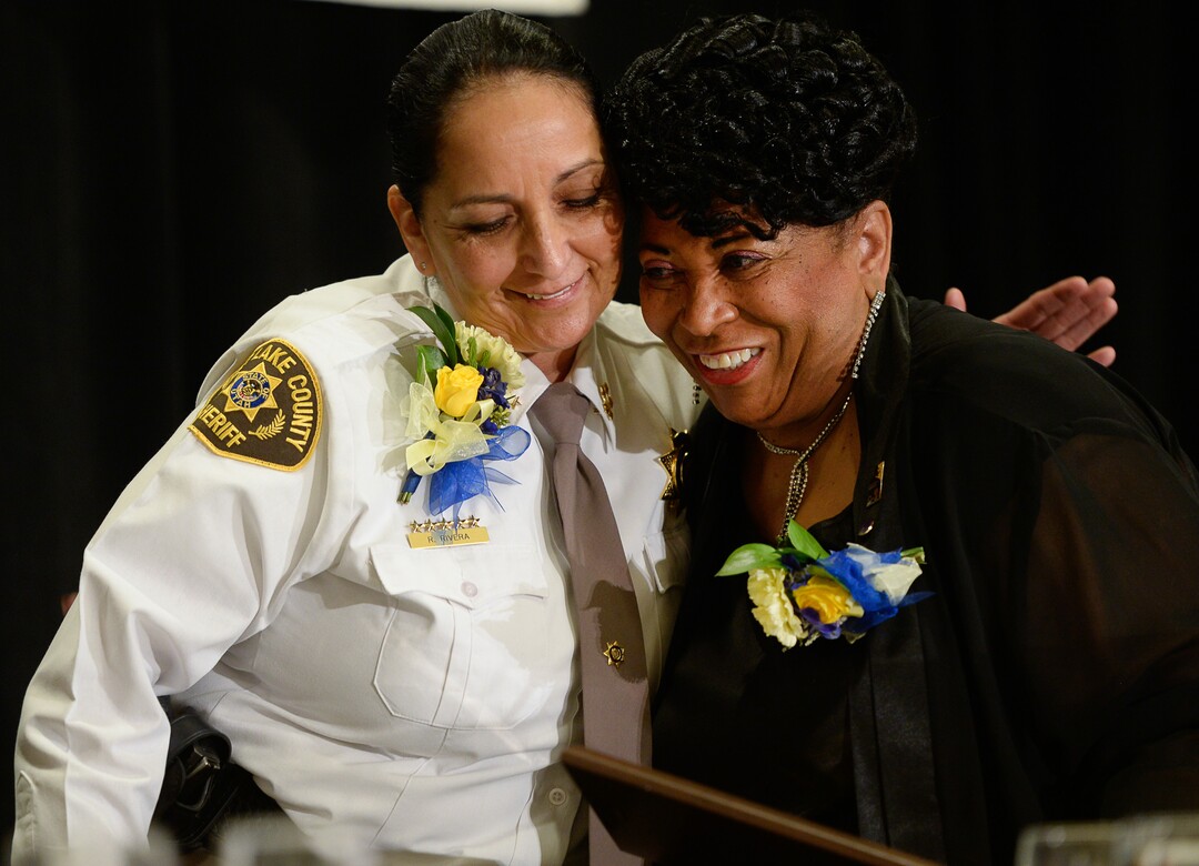 (Francisco Kjolseth  |  The Salt Lake Tribune) Salt Lake County Sheriff Rosie Rivera, is embraced by Jeanetta Williams, President of the NAACP Salt Lake Chapter after receiving the Rosa Parks Award during the Dr. Martin Luther King Jr. Memorial Luncheon at Little America Hotel on Monday, Jan. 20, 2020. Rivera is the first female Sheriff in the state of Utah.