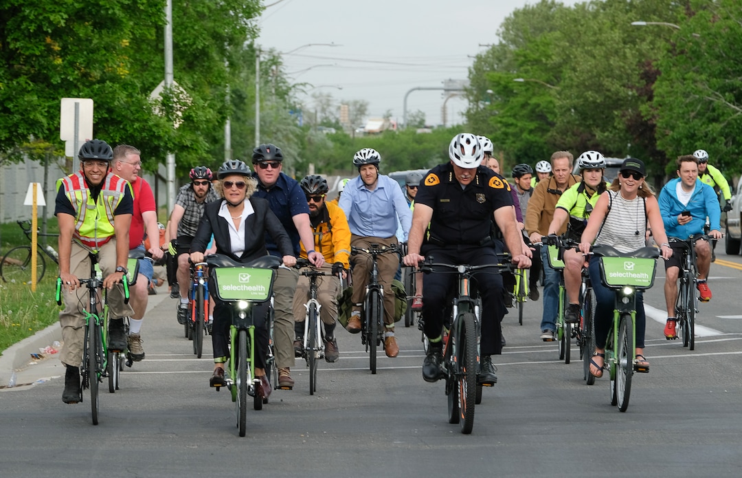 (Francisco Kjolseth  |  The Salt Lake Tribune)  Salt Lake City Mayor Jackie Biskupski is joined by Police Chief Mike Brown, members of the public and city employees on Thursday, May 16, 2019, as part of the annual MayorÕs Bike to Work Day. This yearÕs ride began at the Northwest Recreation Center and ran primarily along the Jordan River Trail in an effort to show off the investments the city and others have made to the trail.