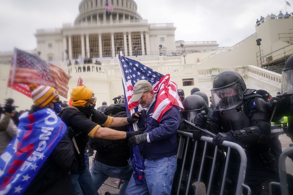 (John Minchillo | AP photo)

In this Jan. 6 photo, rioters try to break through a police barrier at the Capitol in Washington.