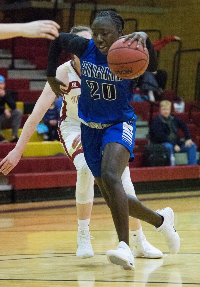 (Rick Egan  |  The Salt Lake Tribune)    Shanyce Makuei takes the ball up the middle, against Viewmont, in prep basketball action, Bingham vs. Viewmont, in Bountiful, Wednesday, January 3, 2018.