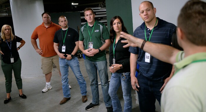 (Al Hartmann | The Salt Lake Tribune)
Police trainers and recruits, left, talk over how they responded to a mental health crisis scenario with a citizen who was violent and suicidal in a training session Thursday, May 10, 2018. The Salt Lake City Police Department hosted a Crisis Intervention Team (CIT) Academy for police officers and police recruit trainees to learn about and identify signs of citizens who are experiencing a mental health crisis.