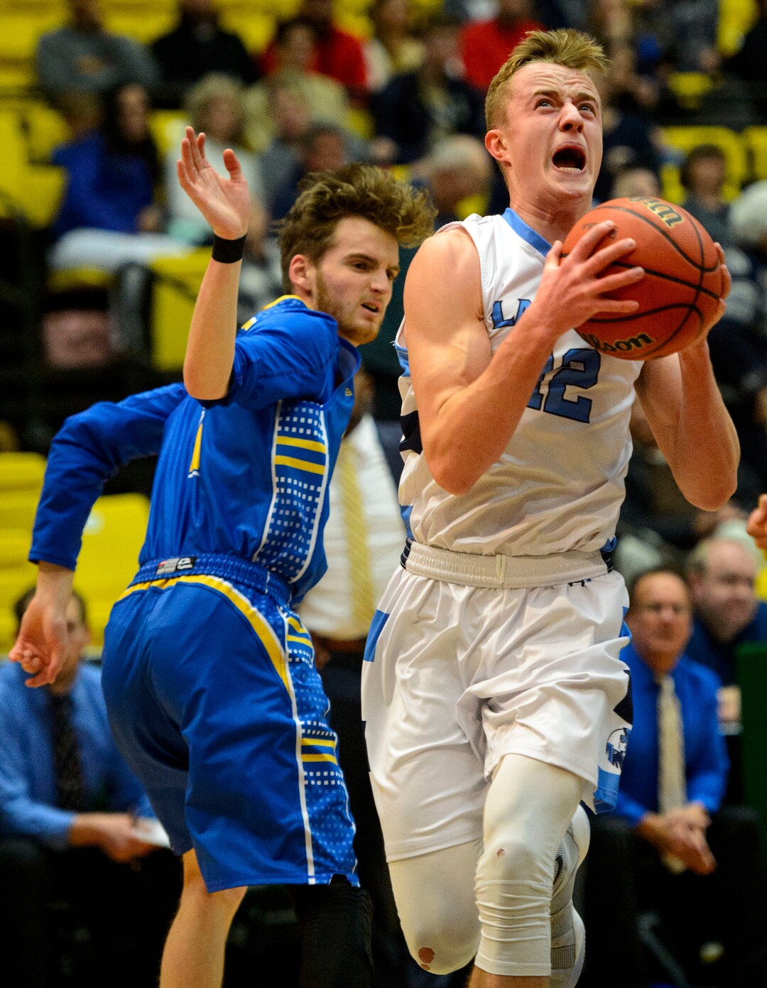 (Steve Griffin  |  The Salt Lake Tribune) Layton's Truman Brown charges into the lane during 6A basketball playoff game against Cyprus at the Utah Valley UniversityÕs UCCU Center in Provo Tuesday Feb. 27, 2018.
