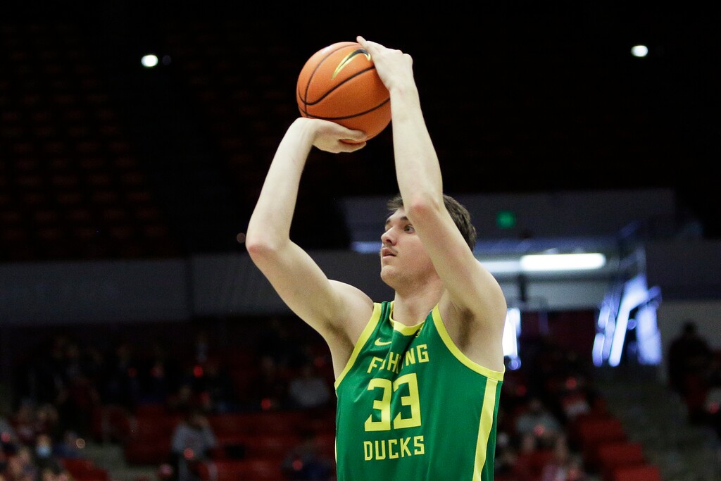 (Young Kwak | AP) Oregon center Isaac Johnson shoots during the second half of an NCAA college basketball game against Washington State, Saturday, March 5, 2022, in Pullman, Wash.
