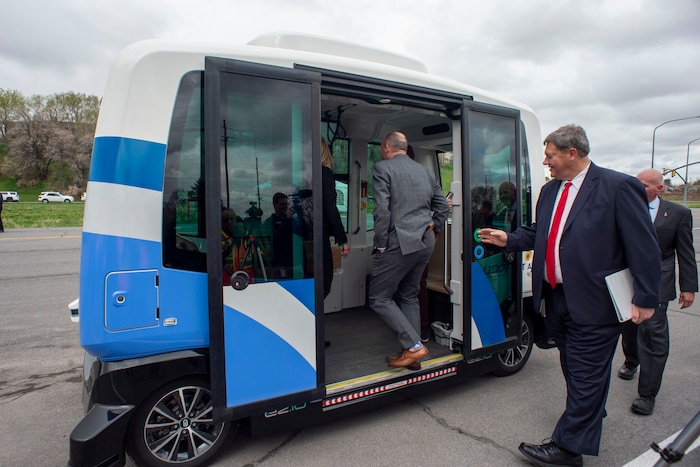 (Rick Egan  |  The Salt Lake Tribune)   Lt. Governor Spencer J. Cox, UDOT Executive Director Carlos Braceras, and UTA Board Chair Carlton Christensen
Board the Autonomous Shuttle for a test drive, at the test track is across the street from UDOT headquarters on the west side of 2700 West. Thursday, April 11, 2019.


