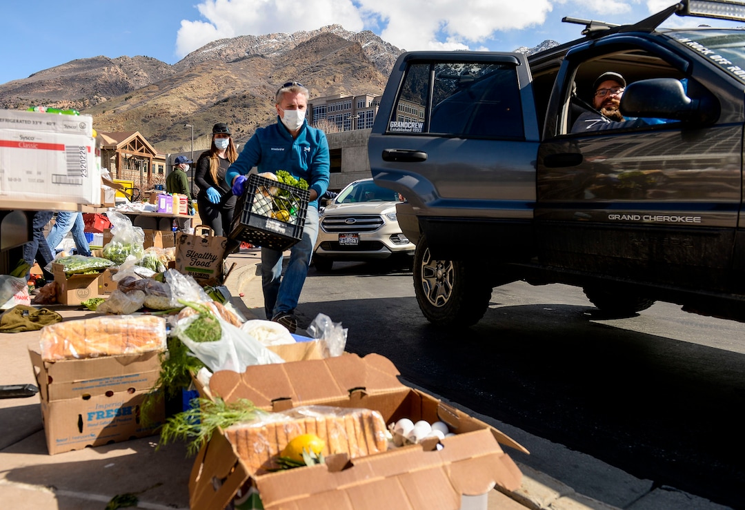 (Leah Hogsten  |  The Salt Lake Tribune)  Snowbird employees handed out over 10,000 pounds of perishable items from the ski resort's restaurants and stores to their workforce, March 21, 2020. The food included milk, eggs, bread, cheeses, every kind of herb, vegetable and fruit, including kumquats and lemon grass, and was given to Snowbird employees on a first-come, first-served basis.