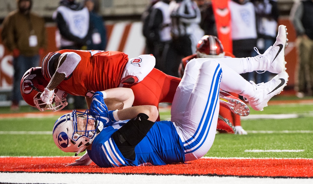 (Rick Egan  |  The Salt Lake Tribune)      Brigham Young tight end Matt Bushman (89) lands in the end zone for a Cougar touchdown, in football action between the Brigham Young Cougars and the Utah Utes, at Rice-Eccles Stadium, Saturday, November 24, 2018.