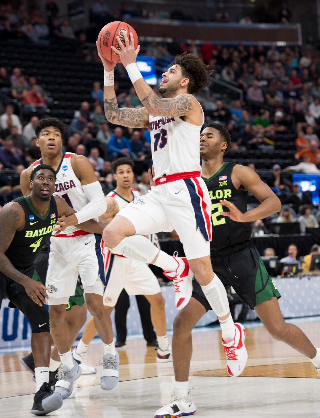 (Leah Hogsten  | The Salt Lake Tribune)  Gonzaga Bulldogs guard Josh Perkins (13) scores as Baylor faces Gonzaga in the second round of the NCAA tournament in Salt Lake City on Saturday, March 23, 2019.