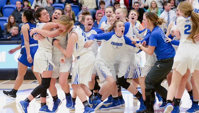 (Leah Hogsten  |  The Salt Lake Tribune) Fremont celebrates the win. Fremont defeated Bingham 61-47 to win the 6A High School Girls' Basketball Tournament title at SLCC in Taylorsville,Saturday, Feb. 24, 2018. 