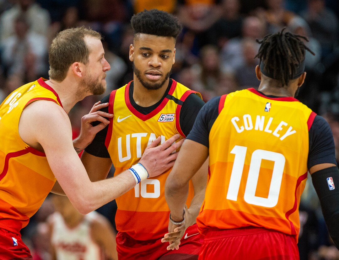 (Rick Egan  |  The Salt Lake Tribune)     Utah Jazz guard Joe Ingles (2) and Utah Jazz guard Mike Conley (10) congratulate Utah Jazz forward Juwan Morgan (16) after he scored a big bucket, in the Jazz 117-114 win over the Portland Trail Blazers, in NBA action in Salt Lake City, Friday, Feb. 7, 2020.