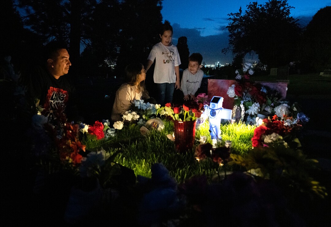 (Rick Egan | The Salt Lake Tribune) Freddie and Karina, the brother and sister of Bernardo Palacios-Carbajal, and niece and nephew, Analiyah, and Aieden visit Bernard's gravesite at the Salt Lake City Cemetery, on Wednesday, May 19, 2021.