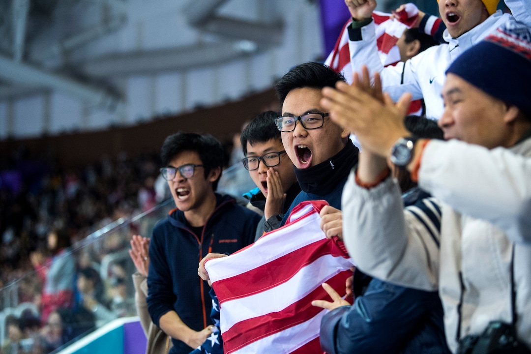 (Chris Detrick  |  The Salt Lake Tribune)  Members of Nathan Chen's family (L-R) brother Colin Chen, cousin Kevin Wang, cousin Jerome Wang and uncle Jing Wang cheer as his score is announced in the Men Single Skating Free Skating at Gangneung Ice Arena during the Pyeongchang 2018 Winter Olympics Saturday, Feb. 17, 2018. Chen landed a record six quadruple jumps, scoring 215.08.