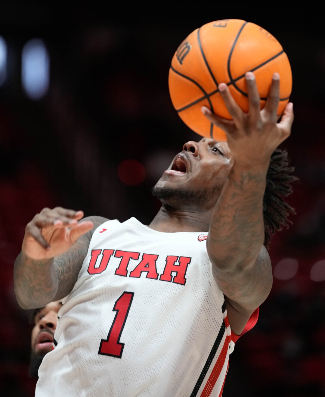 (Francisco Kjolseth | The Salt Lake Tribune) Utah Utes guard David Jenkins Jr. (1) sails in for an attempt on the basket over the Washington State Cougars during an NCAA college basketball game at the Jon M.Huntsman Center, on Saturday, Jan. 8, 2022. Utah lost 61-77.