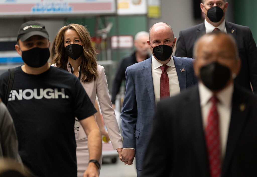 (Francisco Kjolseth | The Salt Lake Tribune) Gov. Spencer Cox is joined by his wife, Abby, as they walk the halls of the Utah Republican Party’s 2021 Organizing Convention at the Maverik Center in West Valley City on Saturday, May 1, 2021.