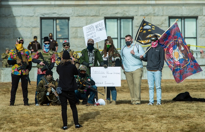 (Rick Egan | The Salt Lake Tribune) The group of Boogaloo bois take a group shot before leaving the Capitol grounds where just over a dozen protesters showed up, on Sunday, Jan. 17, 2021.