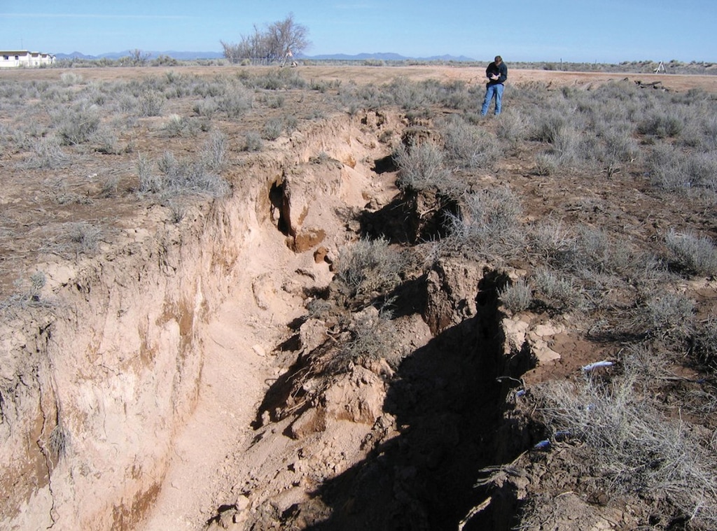 (Utah Geological Survey) An earth fissure caused by flooding in 2005 near Beryl Junction, in the Escalante Valley in Iron County.