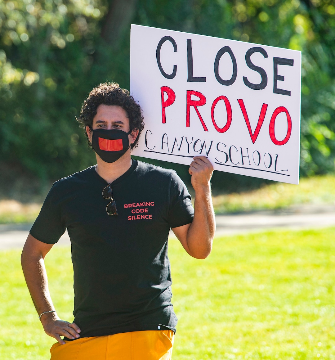 (Rick Egan  |  The Salt Lake Tribune)   Gabe Urzua during a rally calling for the closure of Provo Canyon School, a residential treatment center in Utah she attended when she was a teen, on Friday, Oct. 9, 2020.