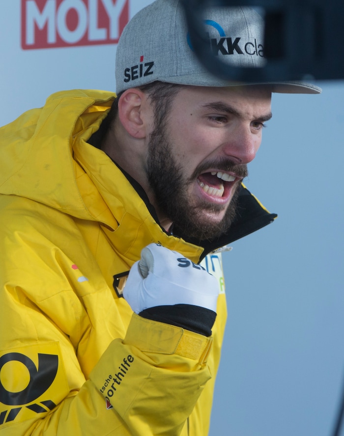 (Rick Egan  |  The Salt Lake Tribune)    Axel Jungk, Germany, celebrates his 3rd place finish in the BMW IBSF World Cup Men's Skeleton competition, Saturday, November 18, 2017.