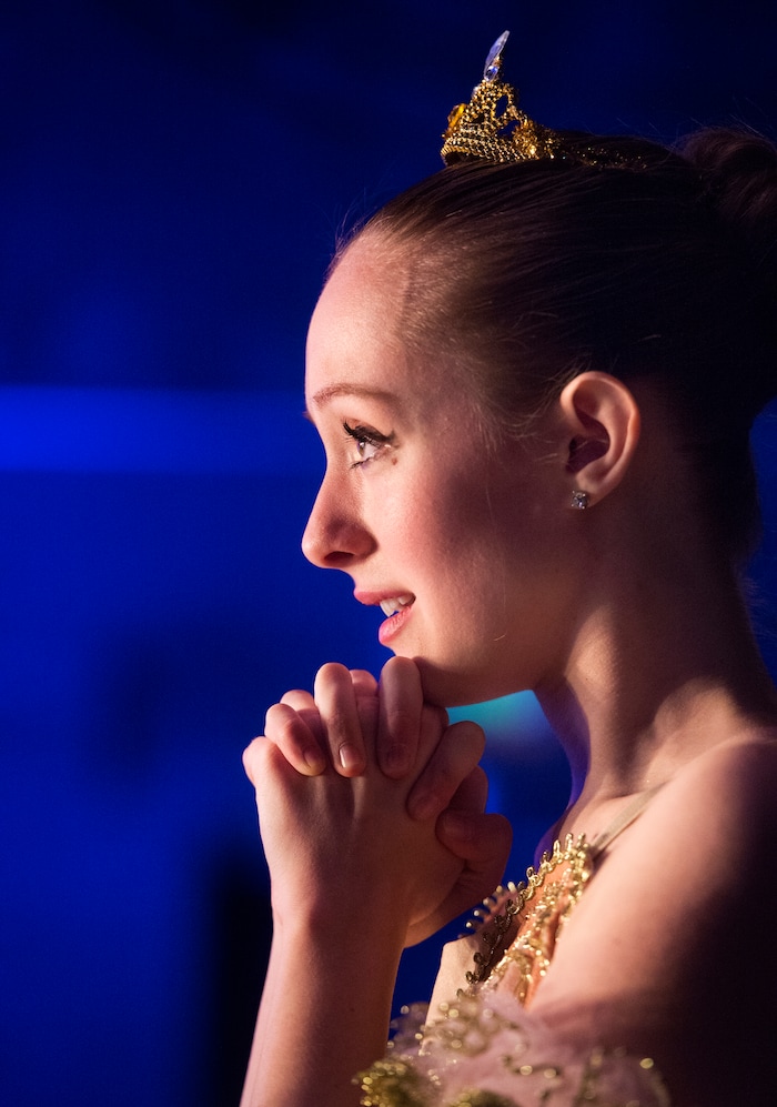 (Rick Egan  |  The Salt Lake Tribune)   Sophie Aste watches Hanna Hardy dance, back stage, as she waits for her to turn to perform, at the 2018 Youth America Grand Prix Regional Semi-Finals at the University of Utah Marriott Center for Dance, Saturday, Feb. 17, 2018.
