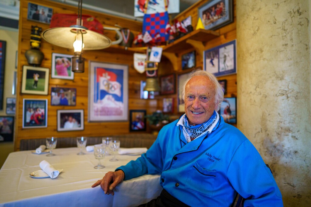(Trent Nelson  |  The Salt Lake Tribune) Adolph Imboden sits at table one, his favorite spot inside his Park City restaurant on Tuesday, April 20, 2021. Adolph's Restaurant, a favorite of elite skiers from around the world, is closing after 47 years in business.
