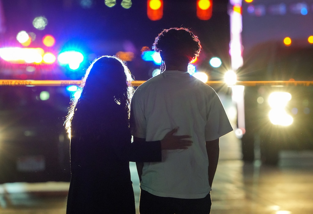 (Chris Samuels | The Salt Lake Tribune) Onlookers watch as police investigate a shooting at a meetinghouse of The Church of Jesus Christ of Latter-day Saints in the Jordan Meadows neighborhood of Salt Lake City on Wednesday, Jan. 7, 2026.