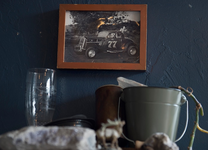 (Scott Sommerdorf   |  The Salt Lake Tribune)   The eclectic decor at The Back Door Deli, 136 Heber Ave., includes this old family photo of Meg Palmer's grandmother during her race car driver days. The Deli is know for some of the best deli sandwiches in Park City.