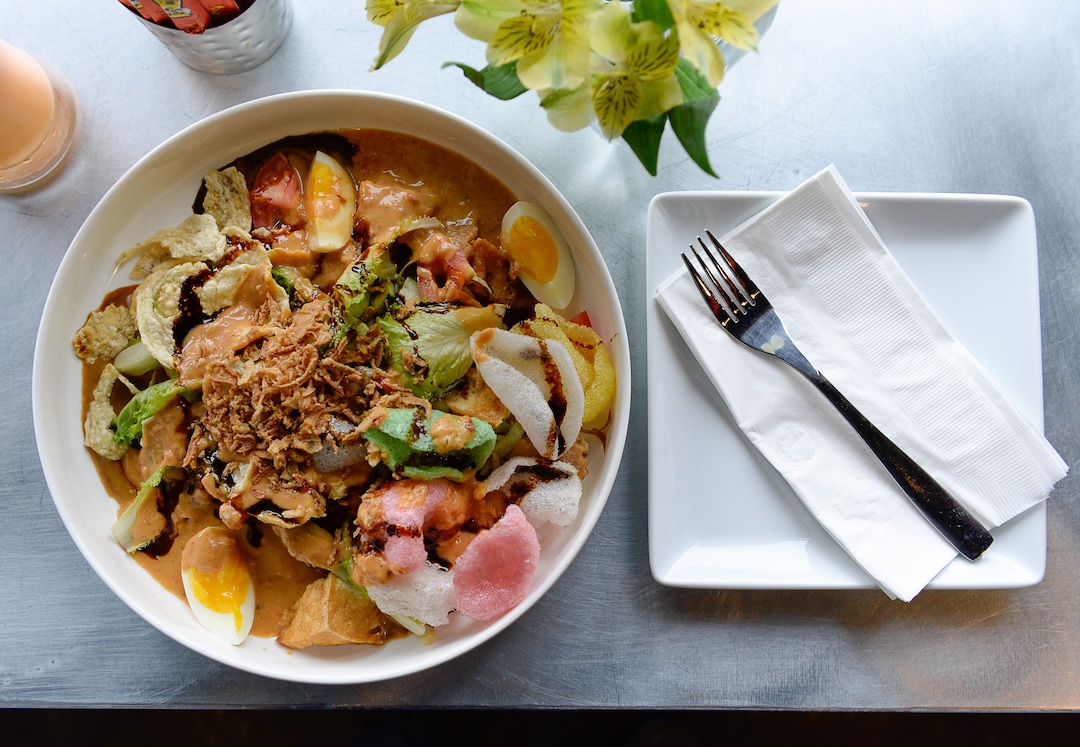 (Francisco Kjolseth  |  The Salt Lake Tribune)  MakanMakan, a new restaurant in Sandy offers Asian street food fare. Gado Gado, Indonesian salad of blanched vegetables, hard boiled egg, fried tofu, fried shallot, shrimp crackers and peanut sauce dressing.