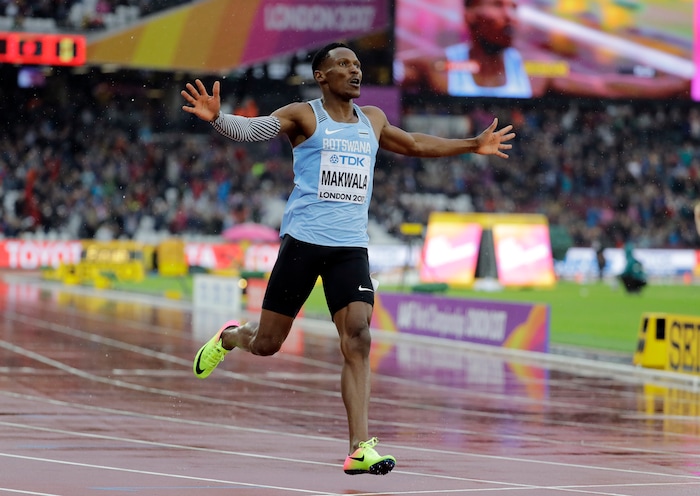 Botswana's Isaac Makwala celebrates after finishing a Men's 200m individual time trial during the World Athletics Championships in London Wednesday, Aug. 9, 2017. Makwala ran an individual time trial to qualify for the 200m semi-finals after he missed the 200m heats and the 400m final as he was barred from competing for 48 hours while organisers tried to halt a norovirus outbreak. (AP Photo/David J. Phillip)