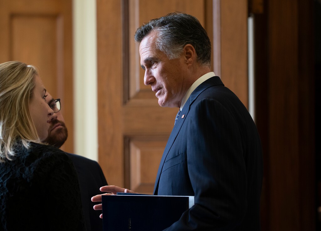(J. Scott Applewhite | AP) Sen. Mitt Romney, R-Utah, arrives at the Senate for a Republican lunch before work resumes in the impeachment trial of President Donald Trump on charges of abuse of power and obstruction of Congress, in Washington, Friday, Jan. 24, 2020.