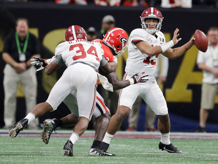 Alabama quarterback Tua Tagovailoa drops back to pass during the second half of the NCAA college football playoff championship game against Georgia Monday, Jan. 8, 2018, in Atlanta. (AP Photo/David J. Phillip)