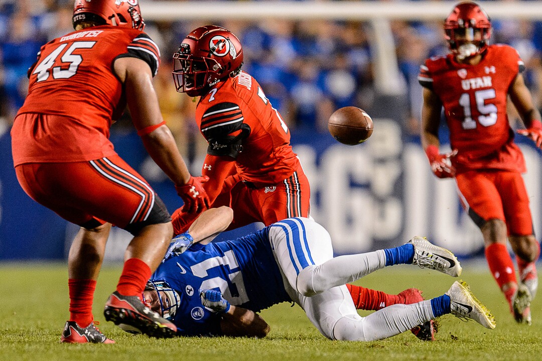 (Trent Nelson | The Salt Lake Tribune)  Utah Utes defensive back Jaylon Johnson (7) and Utah Utes defensive tackle Filipo Mokofisi (45) defend Brigham Young Cougars wide receiver Talon Shumway (21) as BYU hosts Utah, NCAA football in Provo, Saturday September 9, 2017.