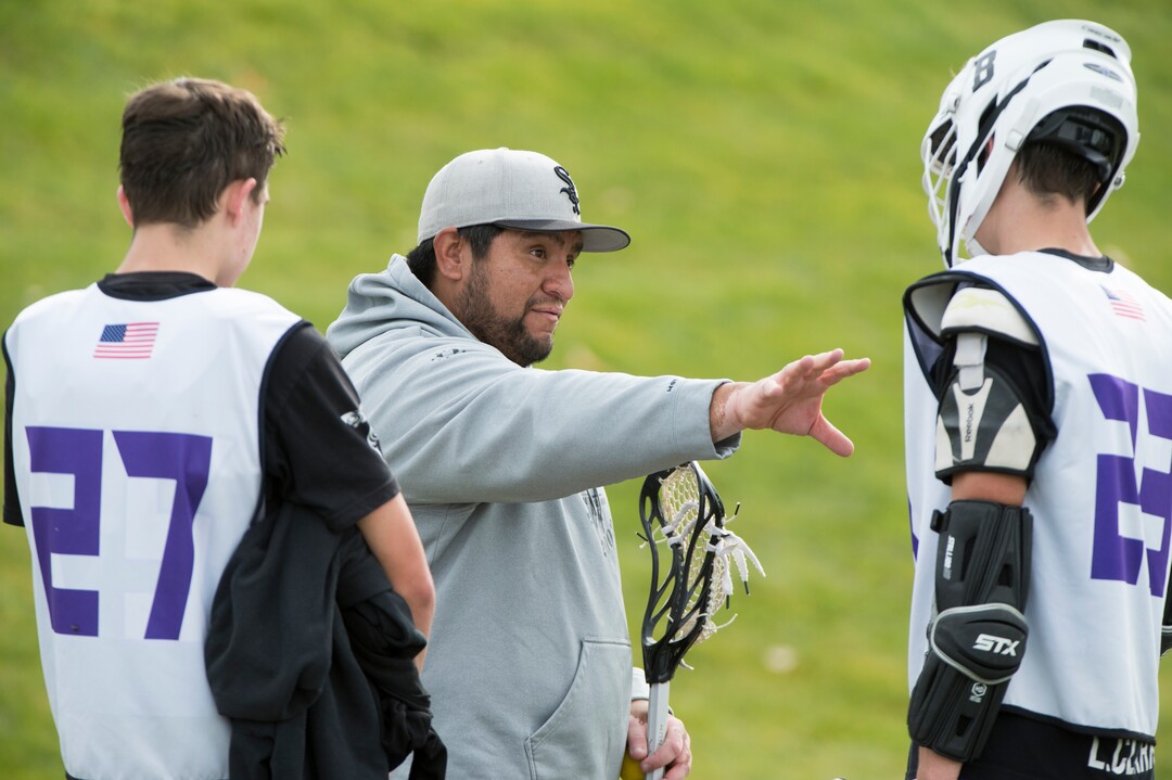 (Rick Egan | The Salt Lake Tribune) Box Elder lacrosse coach Juan Gaytan talks to brothers Harrison and Logan Clark during a tournament in Logan on Saturday, Nov. 3, 2018.
