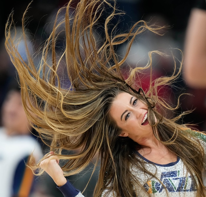 (Francisco Kjolseth | The Salt Lake Tribune) The Jazz dancers let their hair fly during a break in NBA action between the Utah Jazz and the LA Clippers at Vivint Smart Home Arena in Salt Lake City, Wednesday, Dec. 15, 2021.