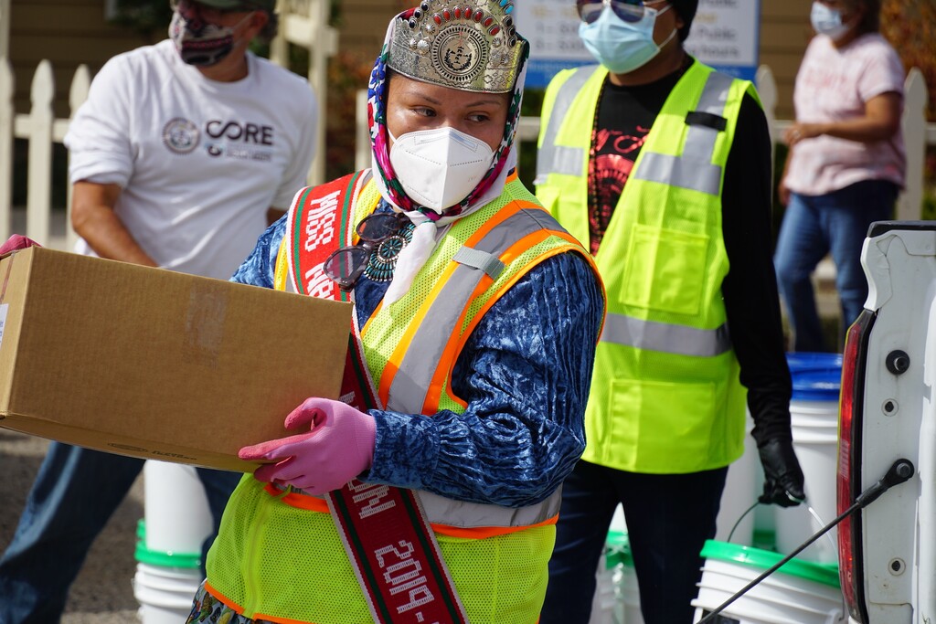 (Zak Podmore | The Salt Lake Tribune) Miss Navajo Nation Shaandiin Parrish distributes food boxes in Aneth, Utah, on Oct. 9, 2020.