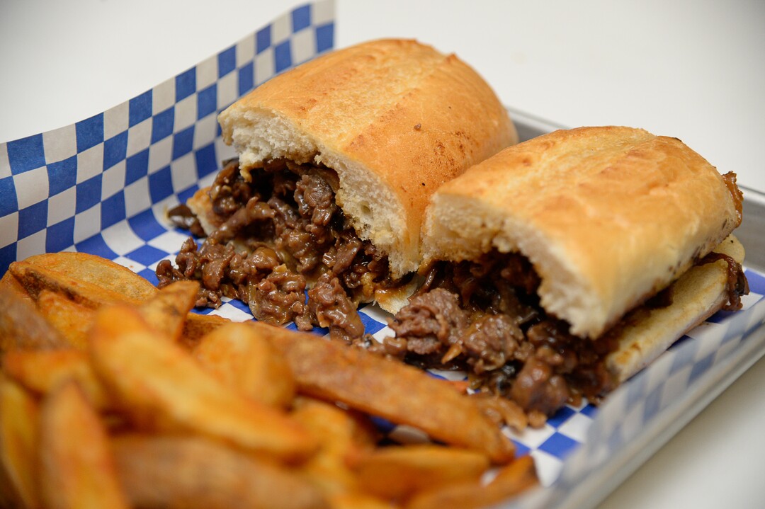 (Francisco Kjolseth  |  The Salt Lake Tribune)  Korean cheesesteak at the Angry Korean fusion restaurant is prepared during the lunch hour on Wed. Sept. 4, 2019. Originally started with a food truck, they now have a sit-down restaurant in South Jordan.
