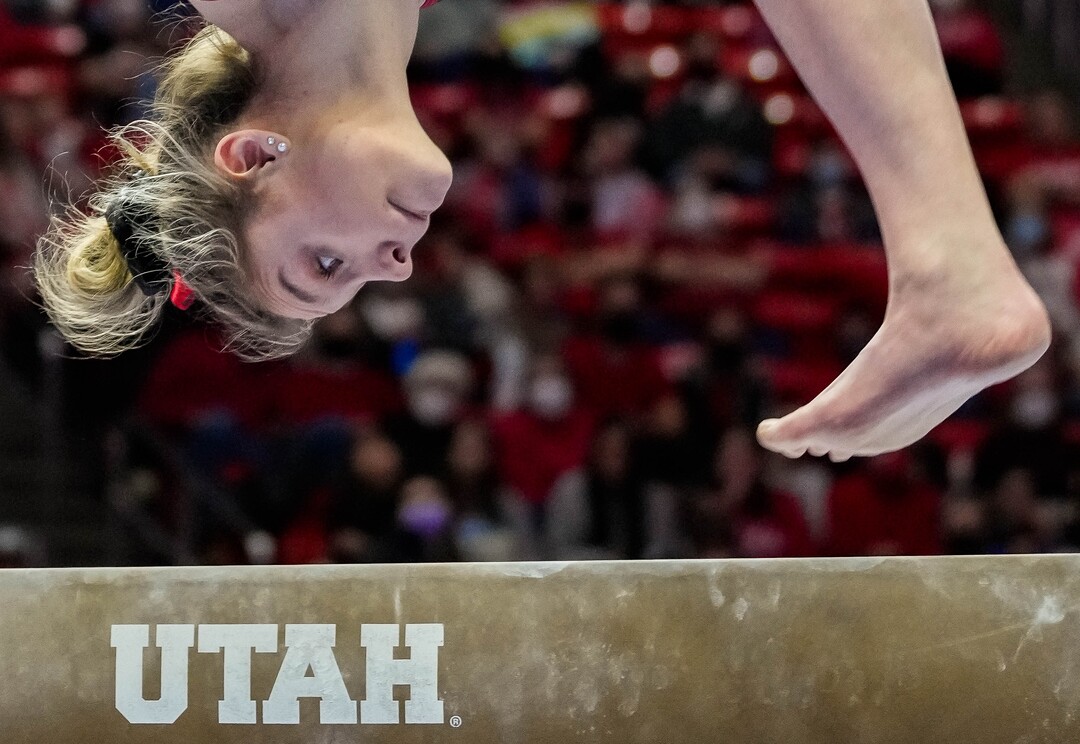(Francisco Kjolseth | The Salt Lake Tribune) Utah’s Grace McCallum sticks her landing on the beam during their gymnastics meet with Stanford at the Huntsman Center in Salt Lake City, Saturday, Jan. 29, 2022.