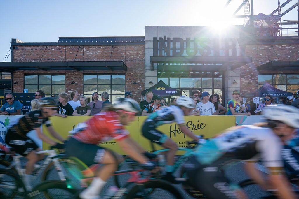 (Braydon Ball | Special to The Tribune) Spectators watch cyclists race in the Salt Lake Criterium at the Granary District on Saturday, July 16, 2022. The next day, Salt Lake City reached 107 degrees, tying an all-time heat record. The National Weather Service said last month was the hottest July on record for the city.