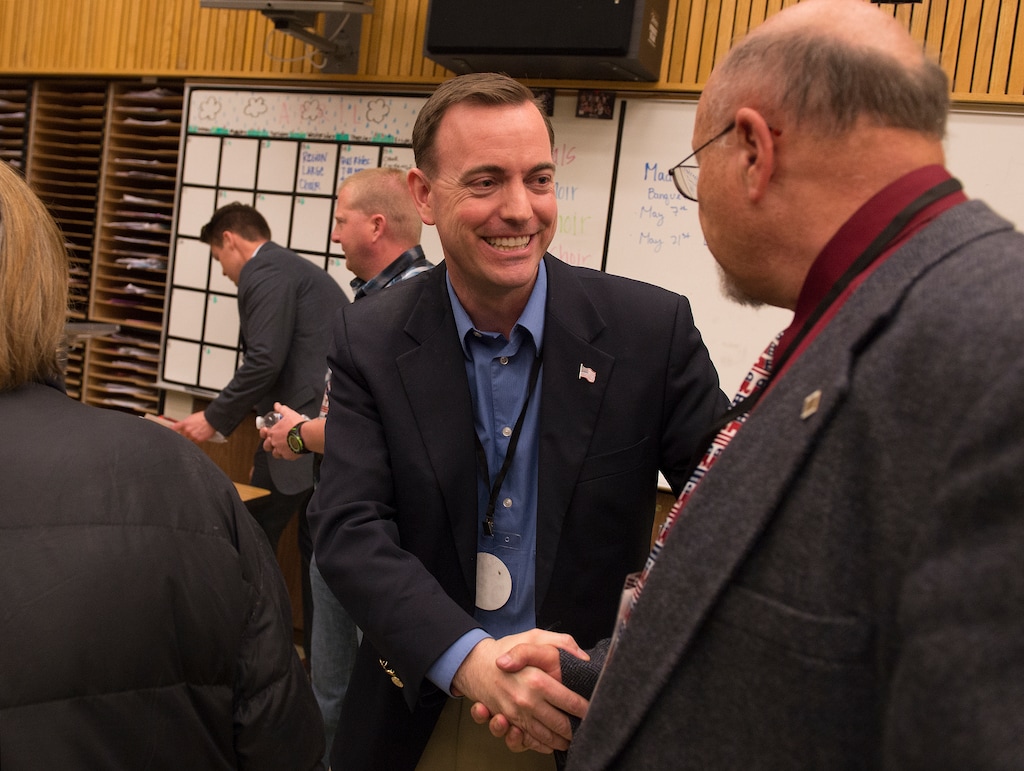 Leah Hogsten | The Salt Lake Tribune
Former West Valley Mayor Mike Winder is congratulated by Utah House district 30 delegates after his win against incumbent Fred Cox at the Salt Lake County Republican Convention, Saturday, April 16, 2016 at Cottonwood High School.
