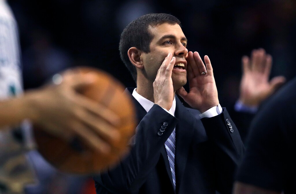 Boston Celtics head coach Brad Stevens calls to his players during the first quarter of an NBA basketball game against the Memphis Grizzlies in Boston, Monday, Feb. 26, 2018. (AP Photo/Charles Krupa)