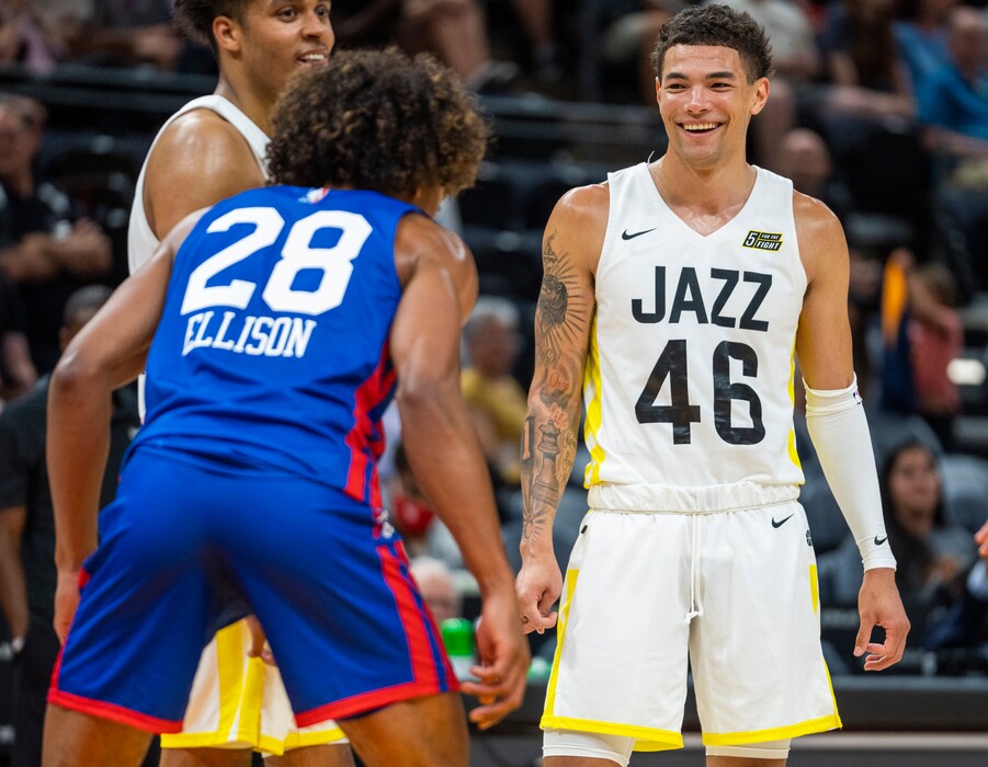 (Rick Egan | The Salt Lake Tribune)   Philadephia 76ers guard Malik Ellison (28) and Utah Jazz forward Jordan Usher (46) share a laugh, during. Break in the action, in the Jazz Summer league, between the Utah Jazz and the Philadelphia 76ers, at Vivint Arena, on Wednesday, July 6, 2022.