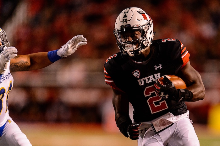 (Trent Nelson | The Salt Lake Tribune)  Utah Utes running back Zack Moss (2) runs the ball as the Utah Utes host the San Jose State Spartans, NCAA football at Rice-Eccles Stadium in Salt Lake City, Saturday September 16, 2017.