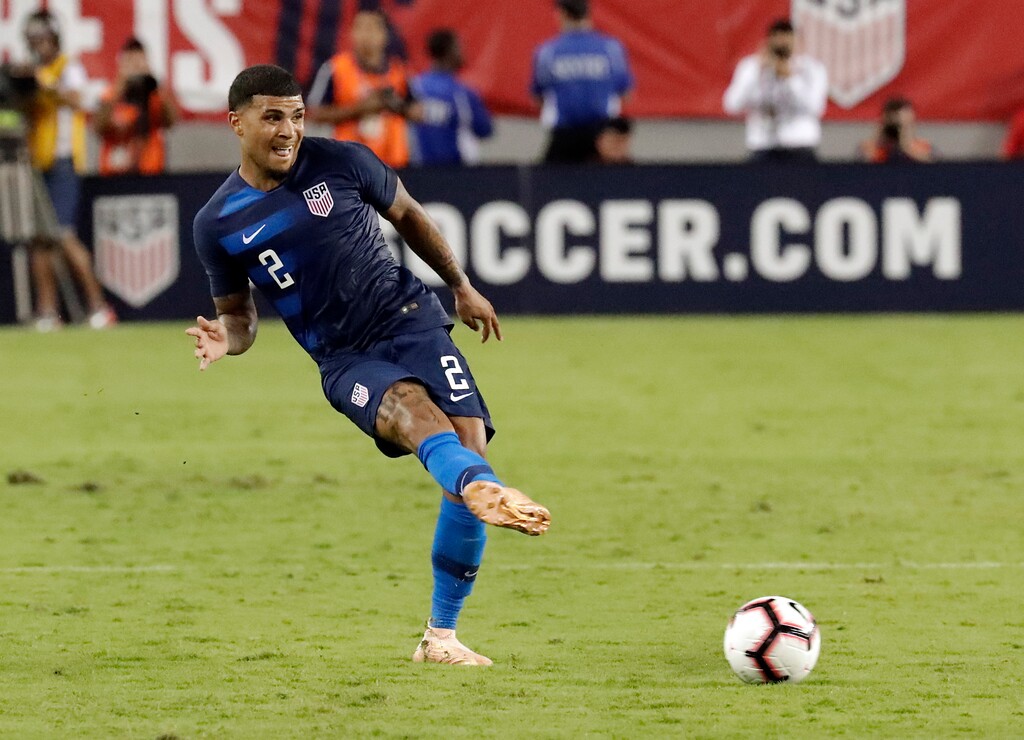 (John Raoux | AP) In this Oct. 11, 2018, file photo, United States' DeAndre Yedlin (2) moves the ball against Colombia during the second half of an international friendly soccer match in Tampa, Fla.